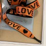 Шнурки оранжевого цвета из репсовой жаккардовая лента с текстом LOVE