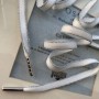 Шнурки для декорирования одежды белые с серебристой каймой