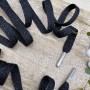 Шнурки трикотажные кругловязаные, чёрные, с матовым люрексом