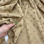 Ткань хлопок шитьё бежевого цвета с бабочками