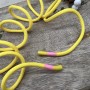 Шнурок трикотажный кругловязаный ярко-желтый с прорезиненными наконечниками
